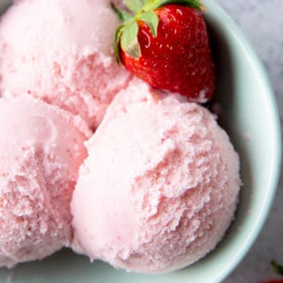 Strawberry Keto Ice Cream (Low Carb): learn how to make keto strawberry ice cream with just a few simple ingredients! Creamy, rich and packed with strawberries! Low Sugar, Dairy-Free, Vegan. #Keto #IceCream #KetoFriendly #LowCarb | Recipe at BeamingBaker.com