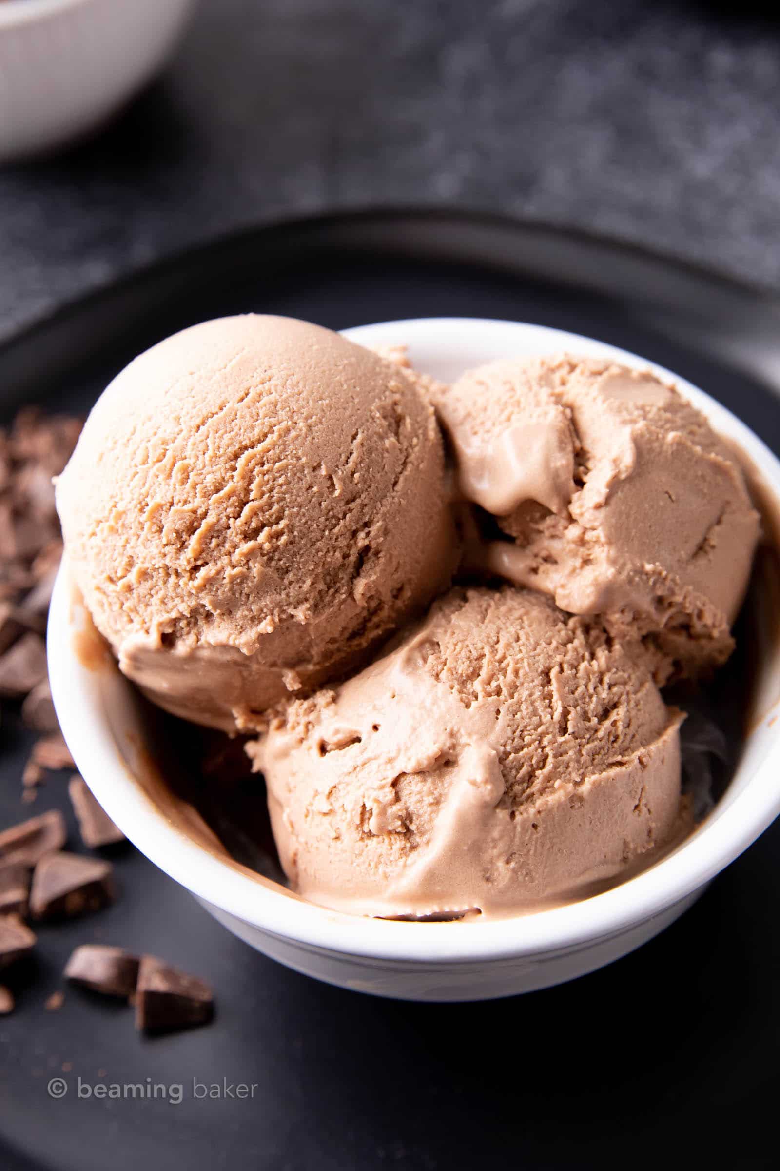 Chocolate Keto Ice Cream Recipe: this decadent chocolate keto ice cream recipe yields rich ‘n creamy homemade keto ice cream. Just 1 net carb for delicious keto ice cream! #Keto #KetoIceCream #LowCarb #Chocolate | Recipe at BeamingBaker.com