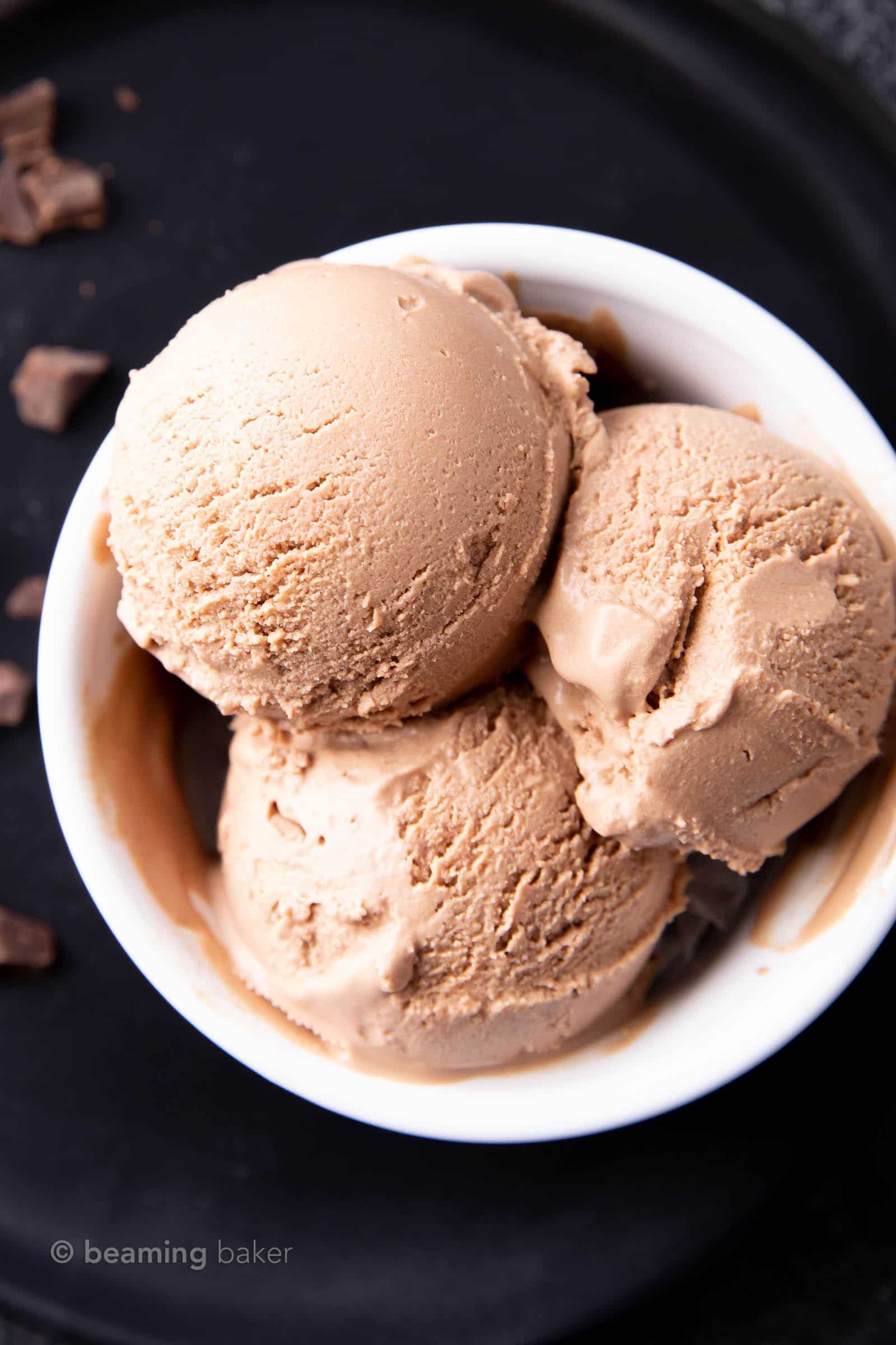 Chocolate Keto Ice Cream Recipe: this decadent chocolate keto ice cream recipe yields rich ‘n creamy homemade keto ice cream. Just 1 net carb for delicious keto ice cream! #Keto #KetoIceCream #LowCarb #Chocolate | Recipe at BeamingBaker.com