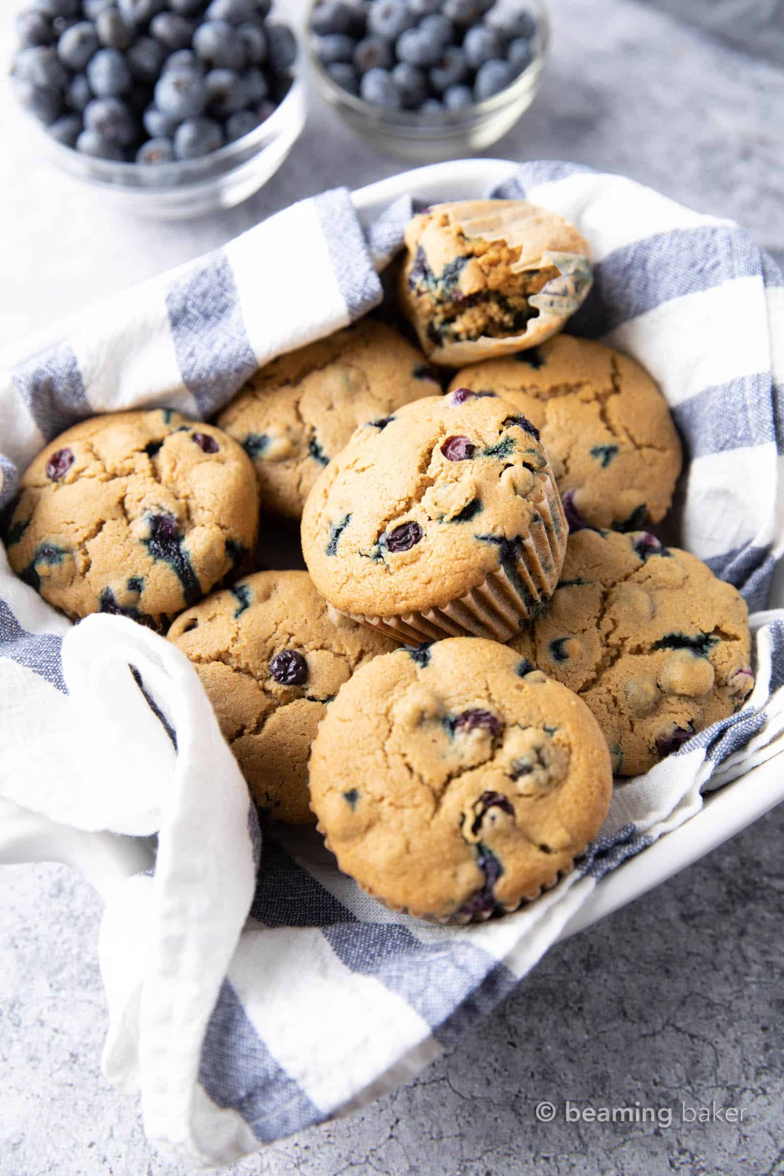 Gluten Free Blueberry Muffins Recipe (Easy!): this GF blueberry muffins recipe creates moist, tender muffins with a delicious, crispy top and fluffy crumb, bursting with blueberries! Vegan, Dairy-Free, Healthy Ingredients. #GlutenFree #GlutenFreeMuffins #Blueberry #Breakfast | Recipe at BeamingBaker.com