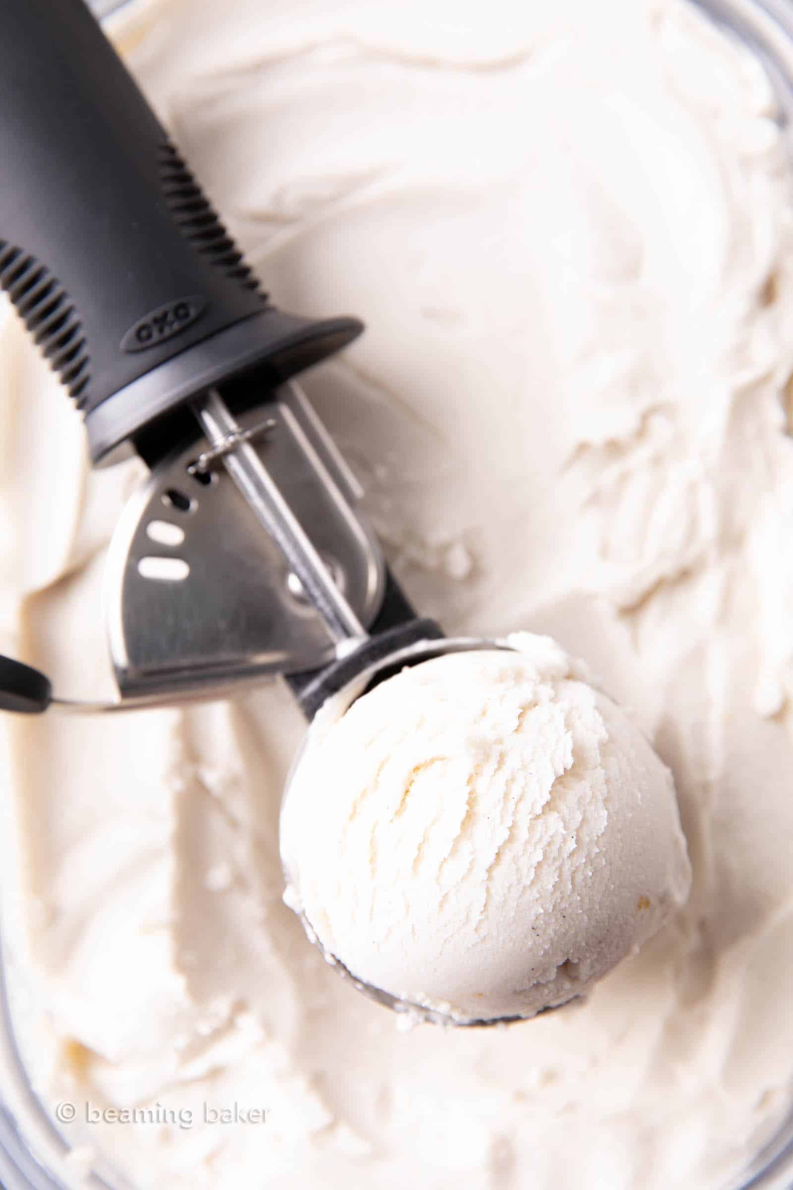 Vegan Vanilla Ice Cream Recipe: this homemade vegan ice cream recipe is easy, rich ‘n creamy. The best vegan vanilla ice cream—incredible vanilla flavor, made with simple ingredients. Dairy-Free. #Vegan #IceCream #DairyFree #NonDairy | Recipe at BeamingBaker.com