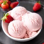 Strawberry Vegan Ice Cream (Dairy-Free): the BEST vegan strawberry ice cream is fresh, sweet & creamy, bursting with strawberry flavor. Homemade vegan ice cream that’s easy! #Vegan #IceCream #DairyFree #Strawberries | Recipe at BeamingBaker.com