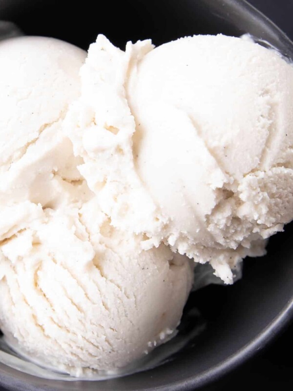 Vegan Vanilla Ice Cream Recipe: this homemade vegan ice cream recipe is easy, rich ‘n creamy. The best vegan vanilla ice cream—incredible vanilla flavor, made with simple ingredients. Dairy-Free. #Vegan #IceCream #DairyFree #NonDairy | Recipe at BeamingBaker.com