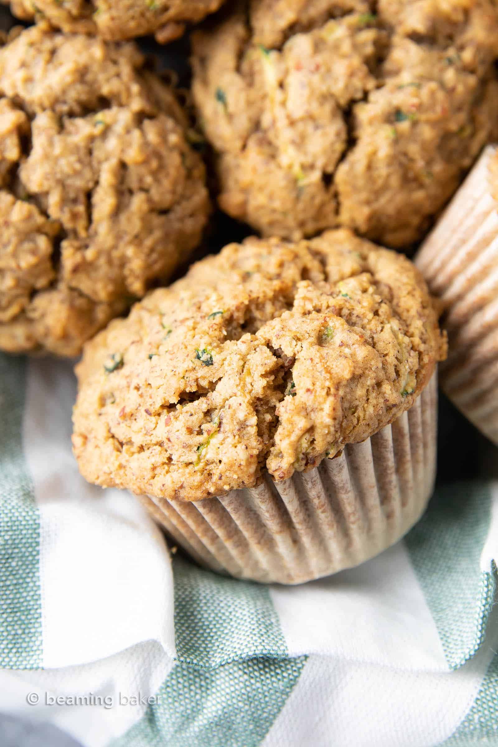 The Best Healthy Zucchini Muffins: Soft ‘n moist zucchini muffins that are buttery, perfectly sweet and made with healthy ingredients. The best zucchini muffin recipe! #Healthy #Zucchini #Muffins #Recipe | Recipe at BeamingBaker.com