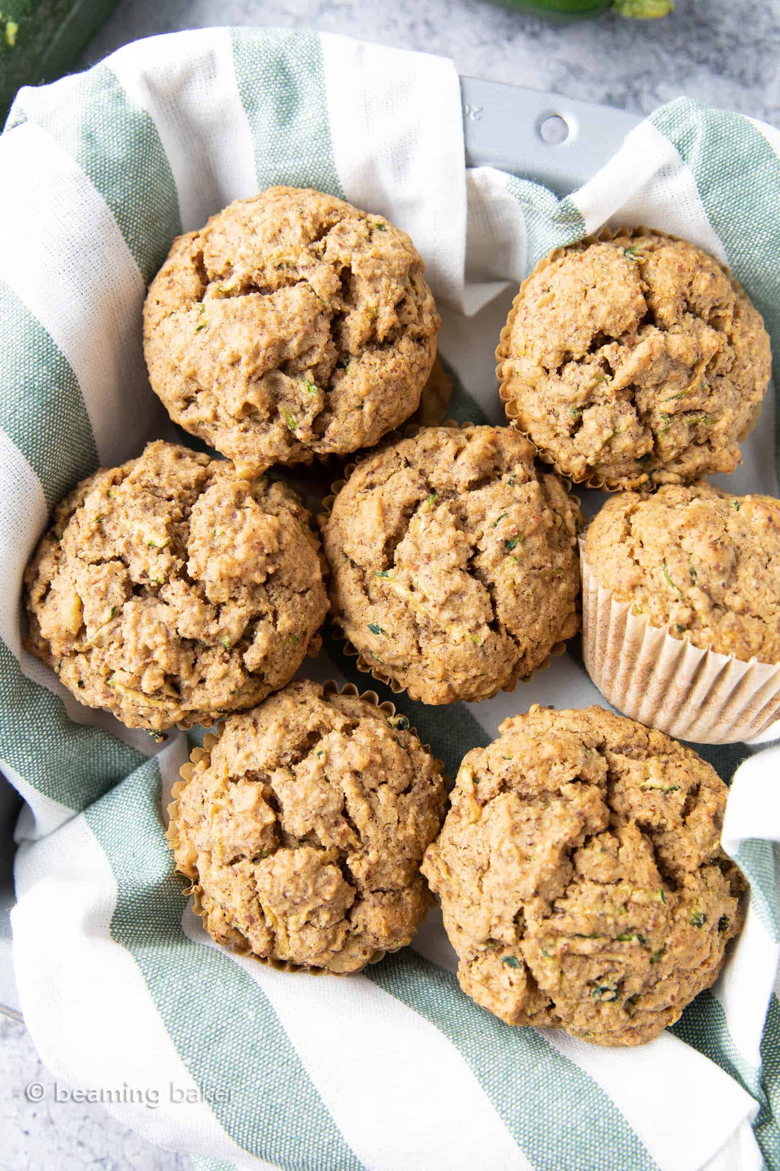 The Best Healthy Zucchini Muffins: Soft ‘n moist zucchini muffins that are buttery, perfectly sweet and made with healthy ingredients. The best zucchini muffin recipe! #Healthy #Zucchini #Muffins #Recipe | Recipe at BeamingBaker.com