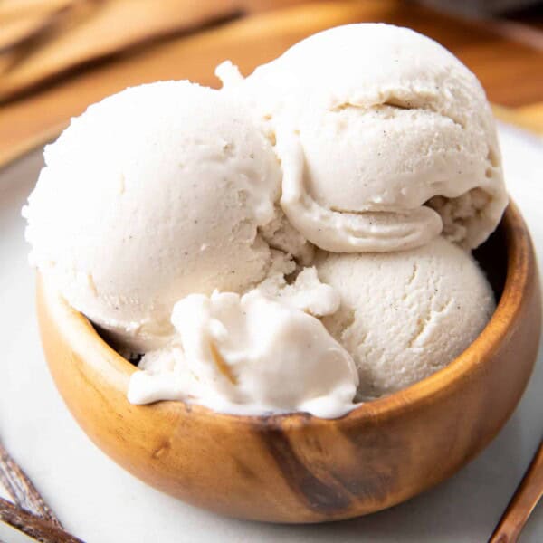 Vanilla Keto Ice Cream (Low Carb): this easy keto vanilla ice cream recipe is rich & creamy with delicious vanilla flavor! The best vanilla keto ice cream recipe—low carb, easy keto-friendly ice cream maker recipe, dairy-free! #KetoDessert #KetoIceCream #LowCarb #LowCarbIceCream #IceCream | Recipe at BeamingBaker.com