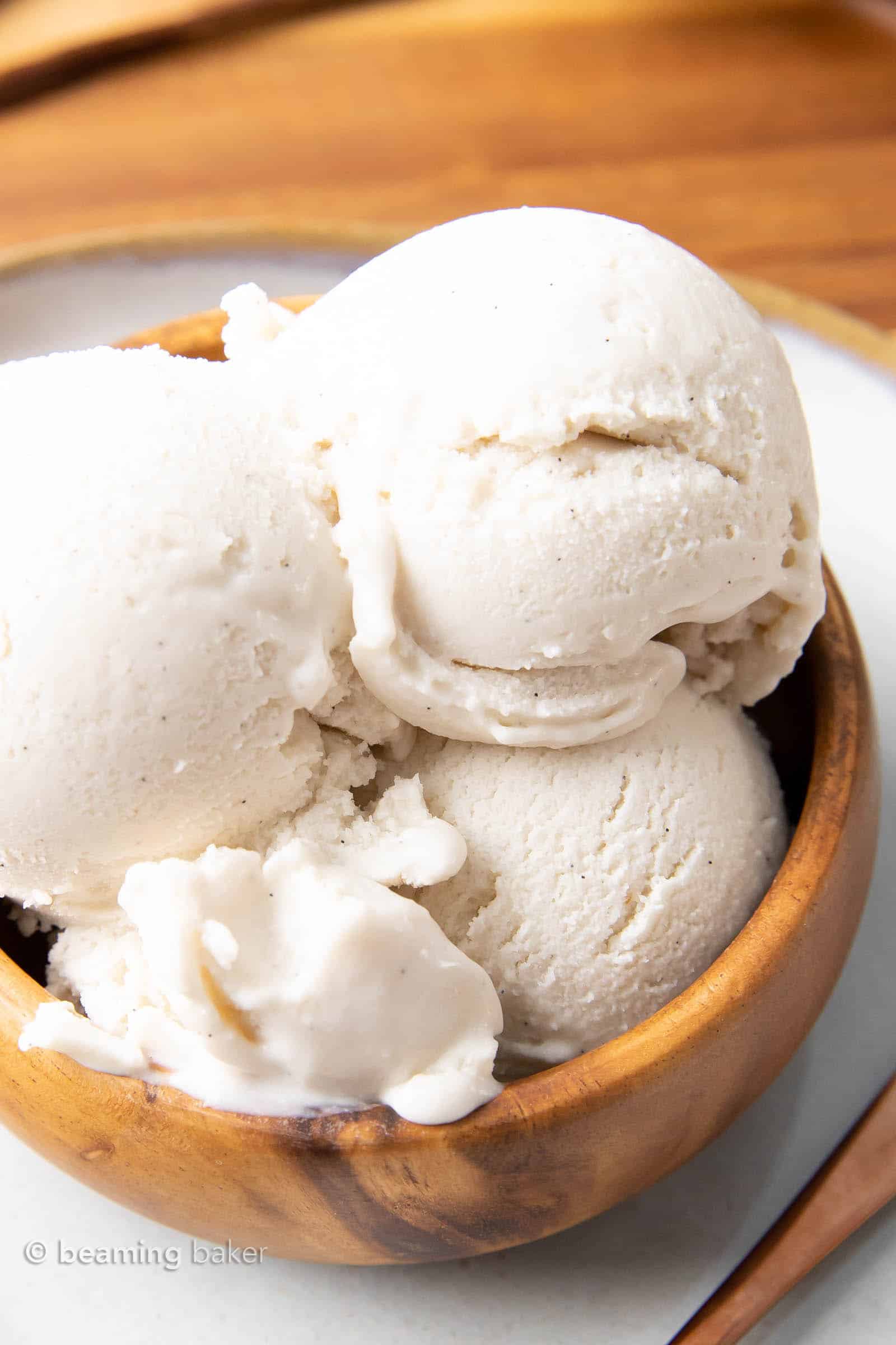 Vanilla Keto Ice Cream (Low Carb): this easy keto vanilla ice cream recipe is rich & creamy with delicious vanilla flavor! The best vanilla keto ice cream recipe—low carb, easy keto-friendly ice cream maker recipe, dairy-free! #KetoDessert #KetoIceCream #LowCarb #LowCarbIceCream #IceCream | Recipe at BeamingBaker.com