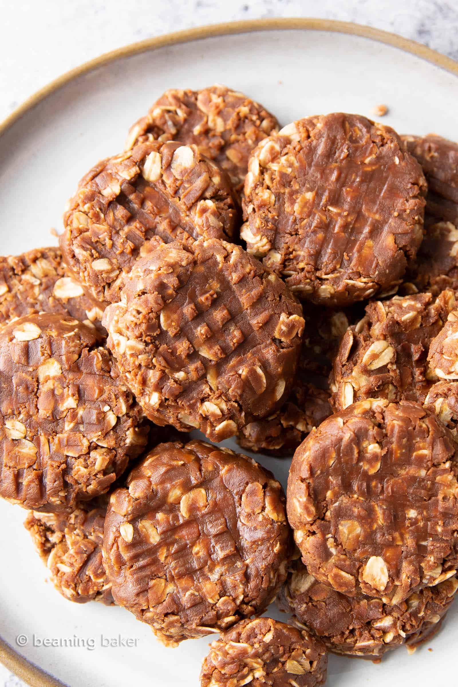 Simple & Easy No Bake Chocolate Oatmeal Cookies: just 4 ingredients for soft & chewy no bake cookies prepared in minutes! Delicious, Healthy and Easy! #NoBake #Oatmeal #Cookies #Chocolate | Recipe at BeamingBaker.com