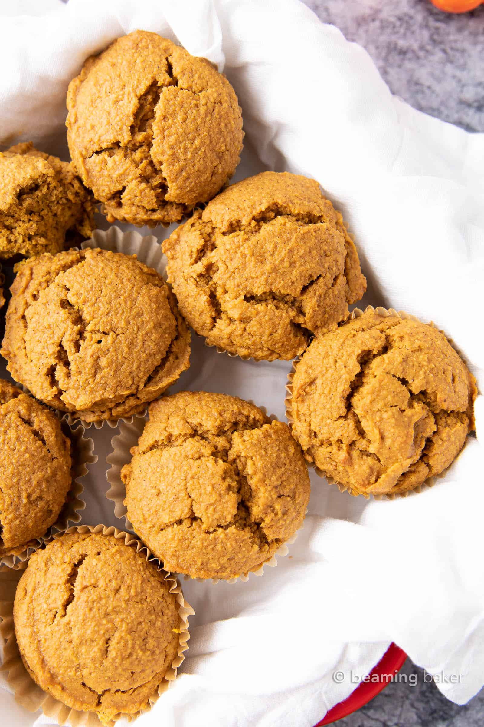 Vegan Pumpkin Muffins: this vegan pumpkin muffin recipe is easy & eggless! The best vegan pumpkin muffins – moist, soft & tender crumb, perfectly spiced. #Vegan #Pumpkin #Muffins #Fall | Recipe at BeamingBaker.com