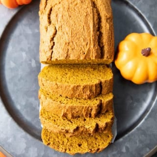 Easy Vegan Pumpkin Bread: this vegan pumpkin bread recipe is moist, deliciously dense & lightly fluffy, with rich pumpkin flavor. The best vegan pumpkin bread! #Vegan #Pumpkin #Bread #Easy | Recipe at BeamingBaker.com