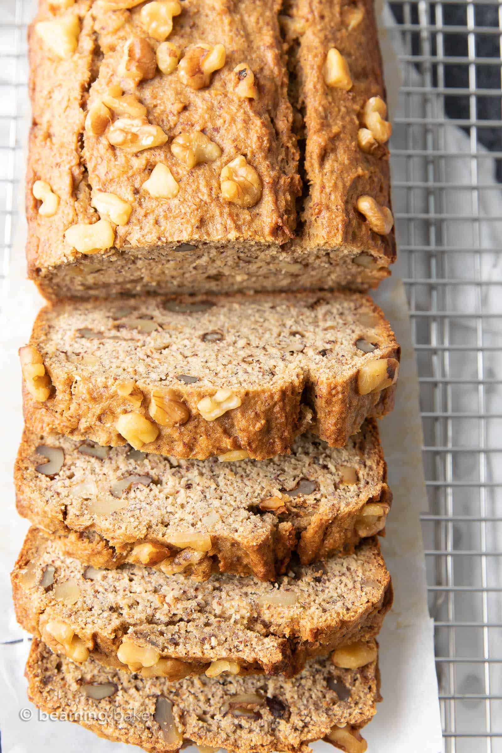 Healthy Banana Bread Recipe: unbelievably delicious banana bread that just so happens to be healthy! Moist ‘n rich with cozy banana flavor and incredible texture—you won’t be able to resist! #BananaBread #Healthy #Banana | Recipe at BeamingBaker.com