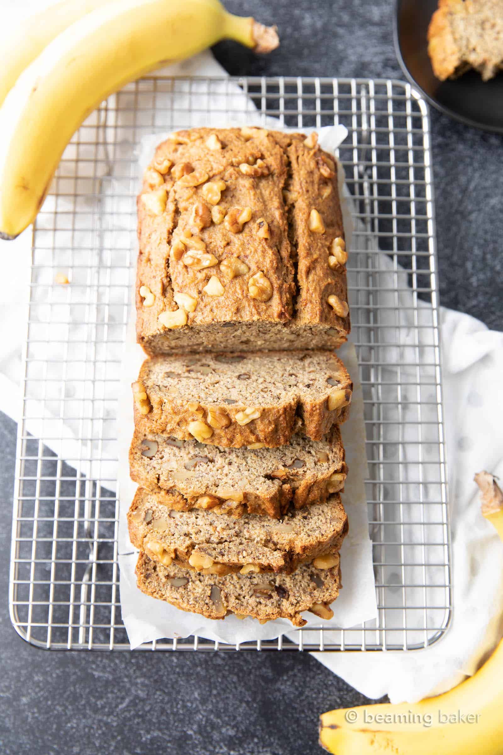 Healthy Banana Bread Recipe: unbelievably delicious banana bread that just so happens to be healthy! Moist ‘n rich with cozy banana flavor and incredible texture—you won’t be able to resist! #BananaBread #Healthy #Banana | Recipe at BeamingBaker.com