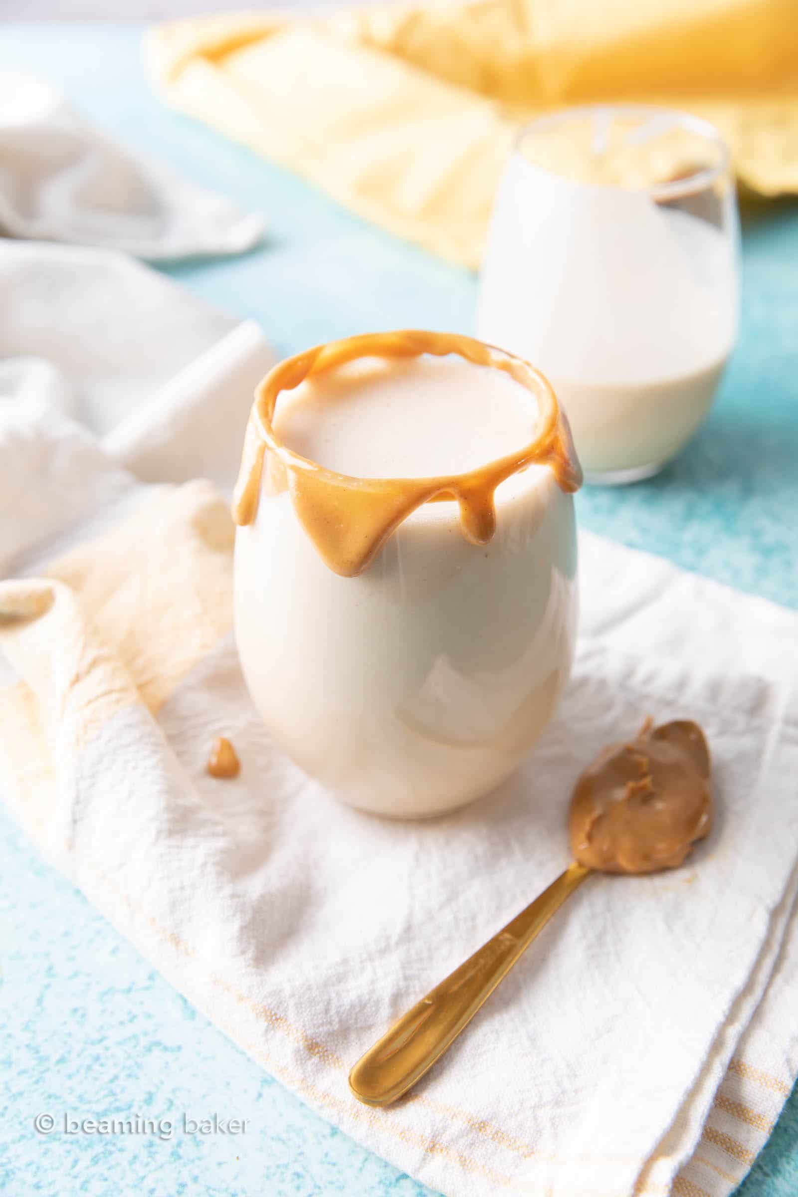 Peanut Butter Protein Shake: this 4 ingredient peanut butter protein shake recipe is ready in minutes! Smooth, creamy and delicious—the best peanut butter protein shake! #PeanutButter #Protein #Shake #ProteinShake | Recipe at BeamingBaker.com