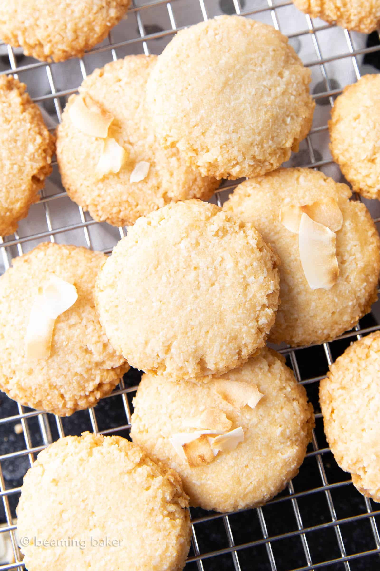 Crunchy Keto Coconut Cookies – 4 ingredient keto coconut cookies that are crunchy & crisp, with delightful coconut flavor. Easy to make, Low Carb! #Keto #KetoCookies #Coconut #LowCarb | Recipe at BeamingBaker.com