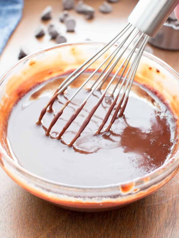 Vegan Chocolate Ganache: just 2 ingredients for the best vegan chocolate ganache—velvety, rich and chocolatey. Only 5 minutes to vegan chocolate delight. #Vegan #ChocolateGanache #Ganache #VeganChocolate | Recipe at BeamingBaker.com