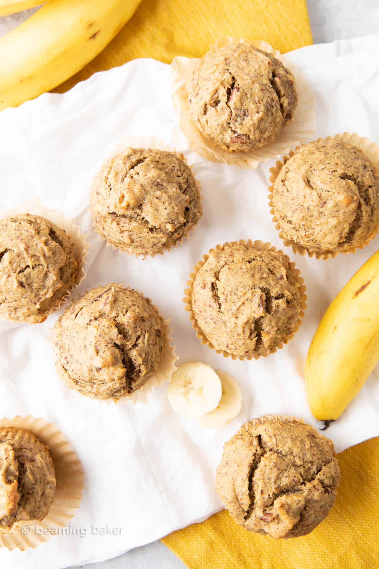 Healthy Banana Muffins Recipe: the BEST healthy banana muffins—secretly healthy, soft ‘n dense banana bread-style muffins with lightly sweet, comforting banana flavor. Made with healthy, whole ingredients. #HealthyMuffins #Banana #Muffins #BananaMuffins | Recipe at BeamingBaker.com