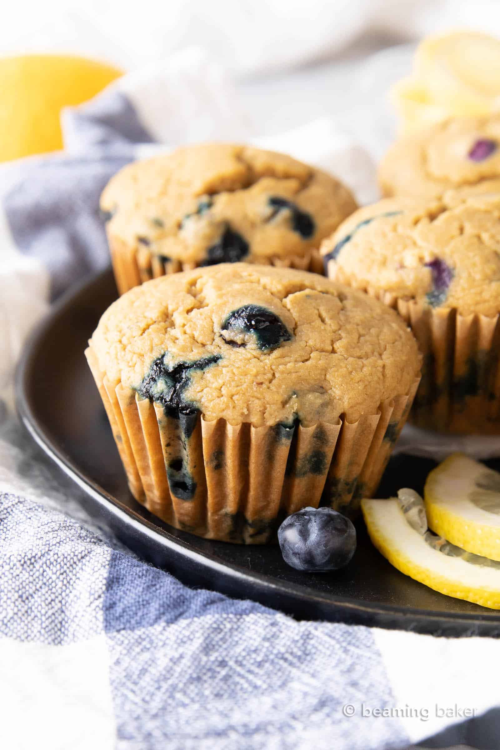 Healthy Lemon Blueberry Muffins: moist ‘n delicious healthy lemon blueberry muffins made with healthy, whole ingredients. #Lemon #Muffins #Healthy #Blueberry | Recipe at BeamingBaker.com