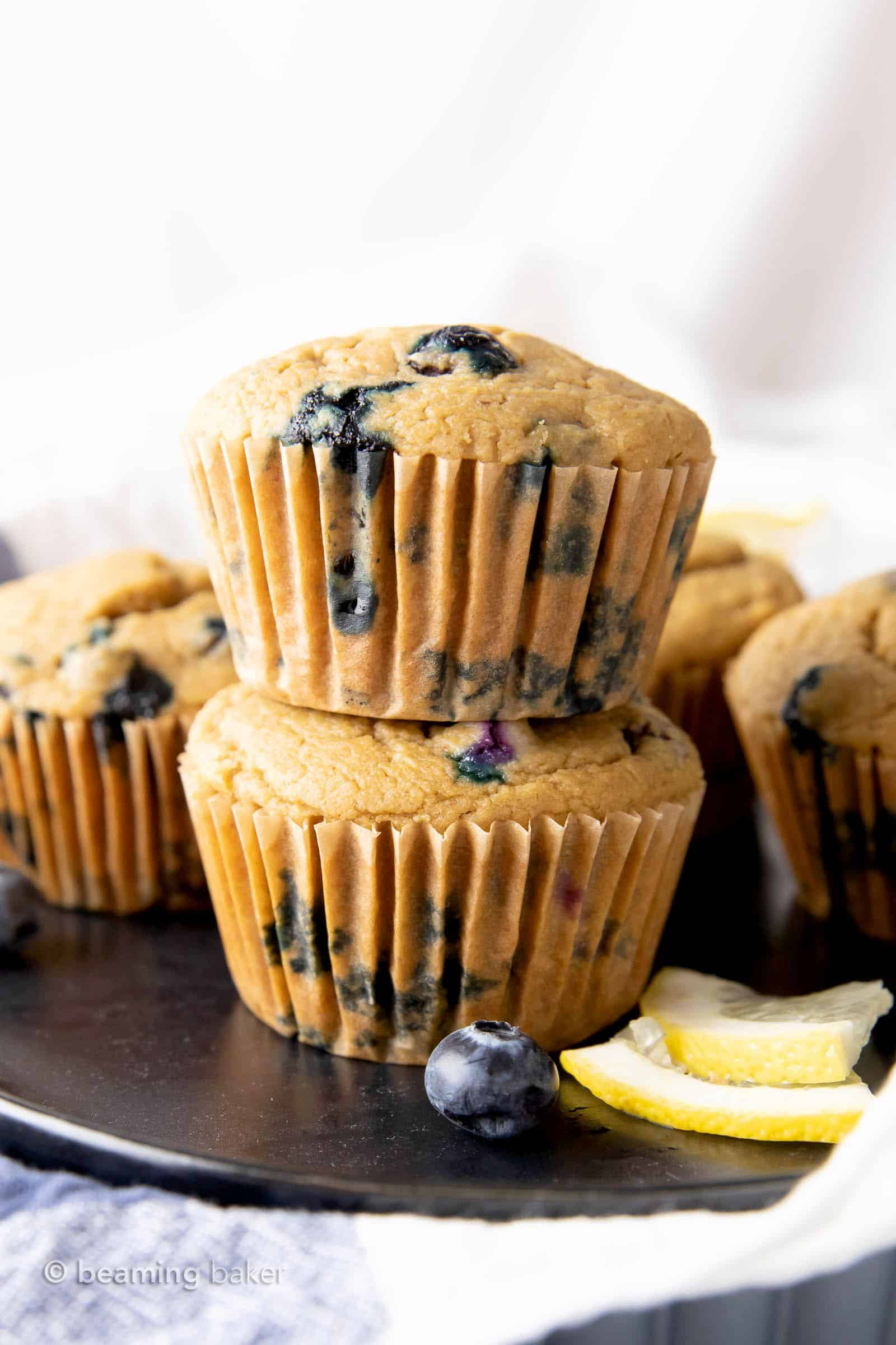 Healthy Lemon Blueberry Muffins: moist ‘n delicious healthy lemon blueberry muffins made with healthy, whole ingredients. #Lemon #Muffins #Healthy #Blueberry | Recipe at BeamingBaker.com