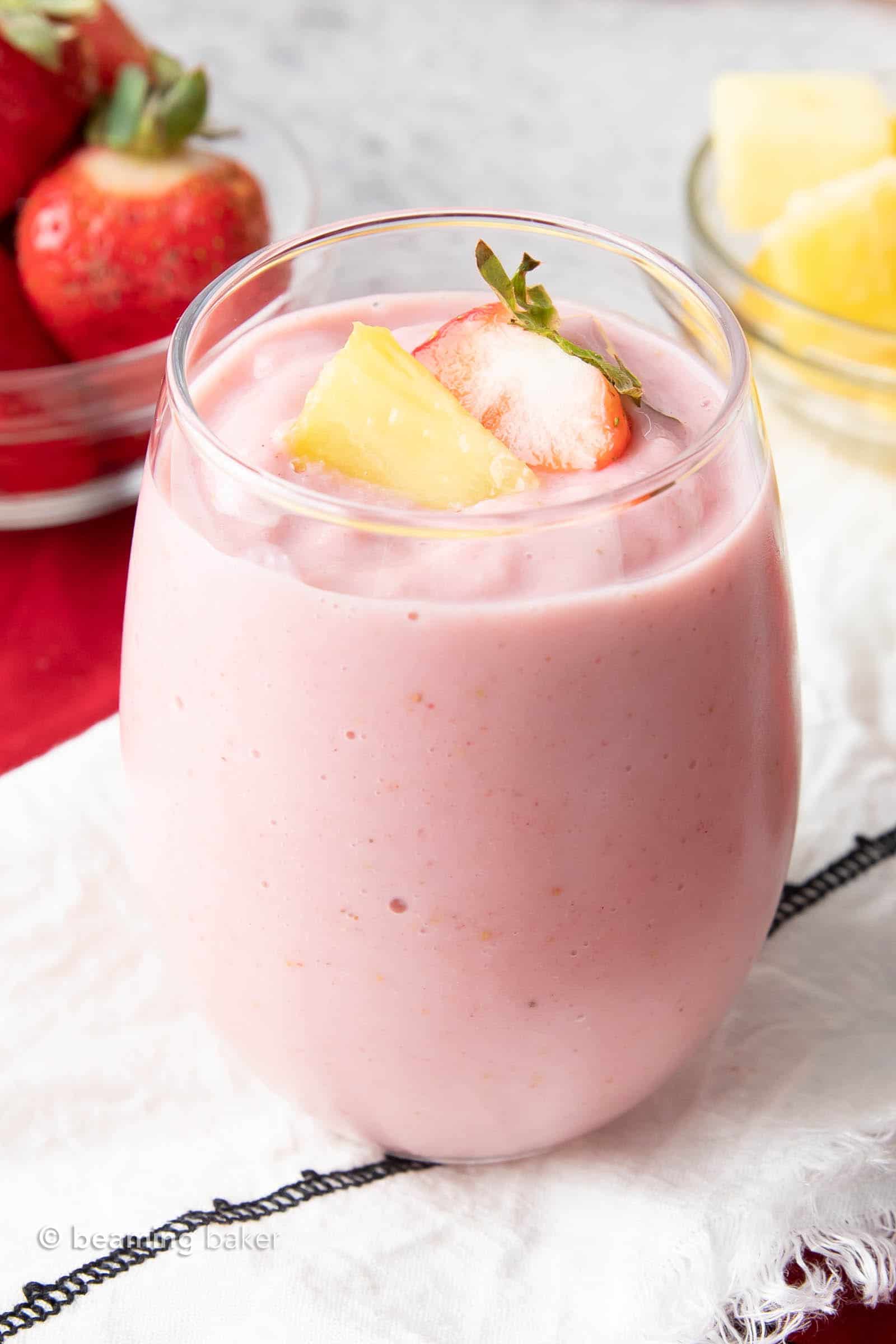 Creamy pineapple and strawberry breakfast smoothies - Simply Delicious