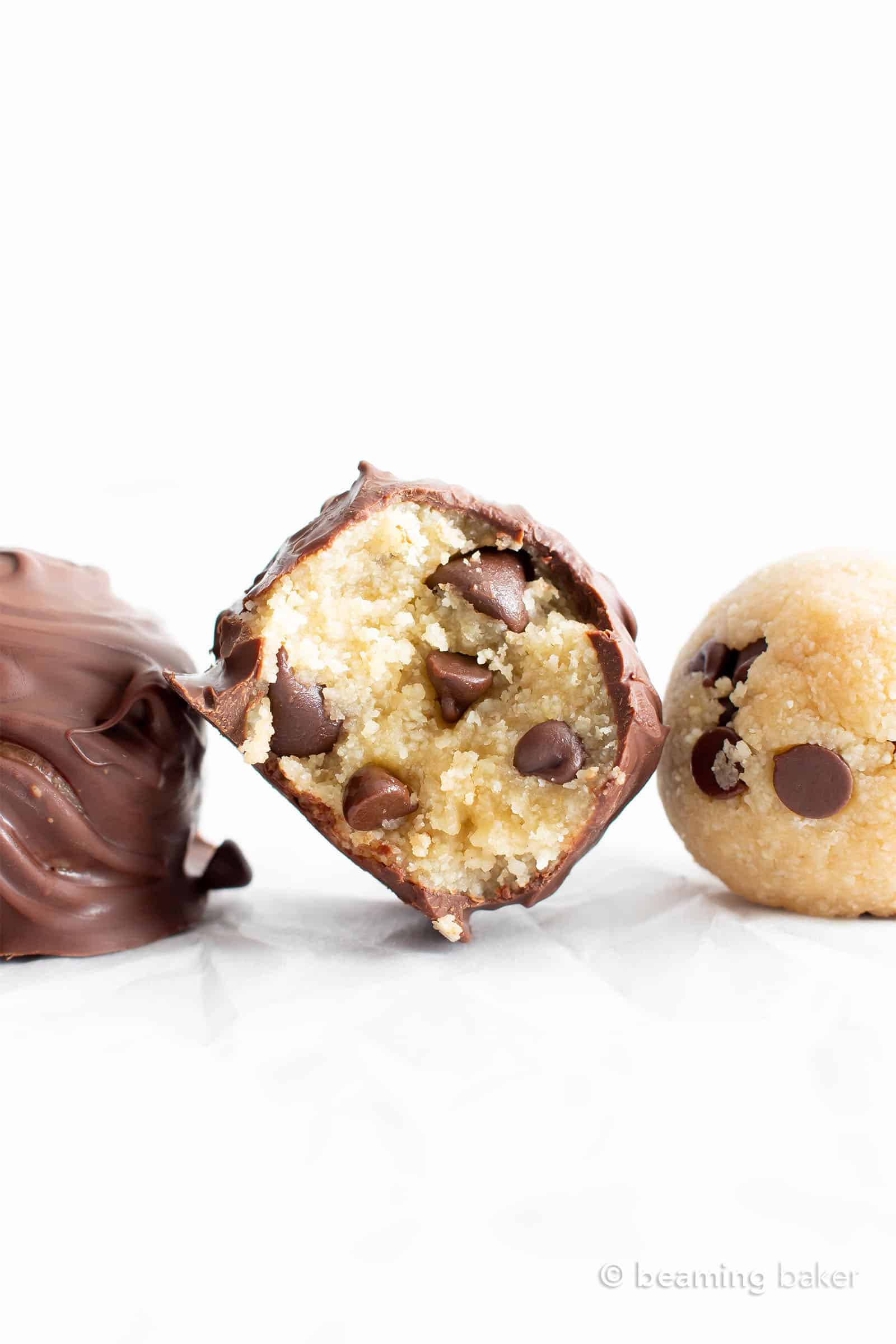 Healthy Cookie Dough Truffles: the ultimate healthy edible cookie dough recipe yields rich ‘n satisfying healthy cookie dough bites wrapped in velvety chocolate. #Healthy #CookieDough #Edible | Recipe at BeamingBaker.com