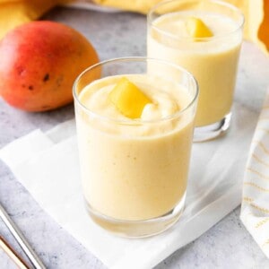 Mango Smoothie: just 3 ingredients for the easiest mango smoothie recipe! Refreshing, creamy and delicious—the best mango smoothie! #Mango #Smoothie #Mangoes #Smoothies | Recipe at BeamingBaker.com