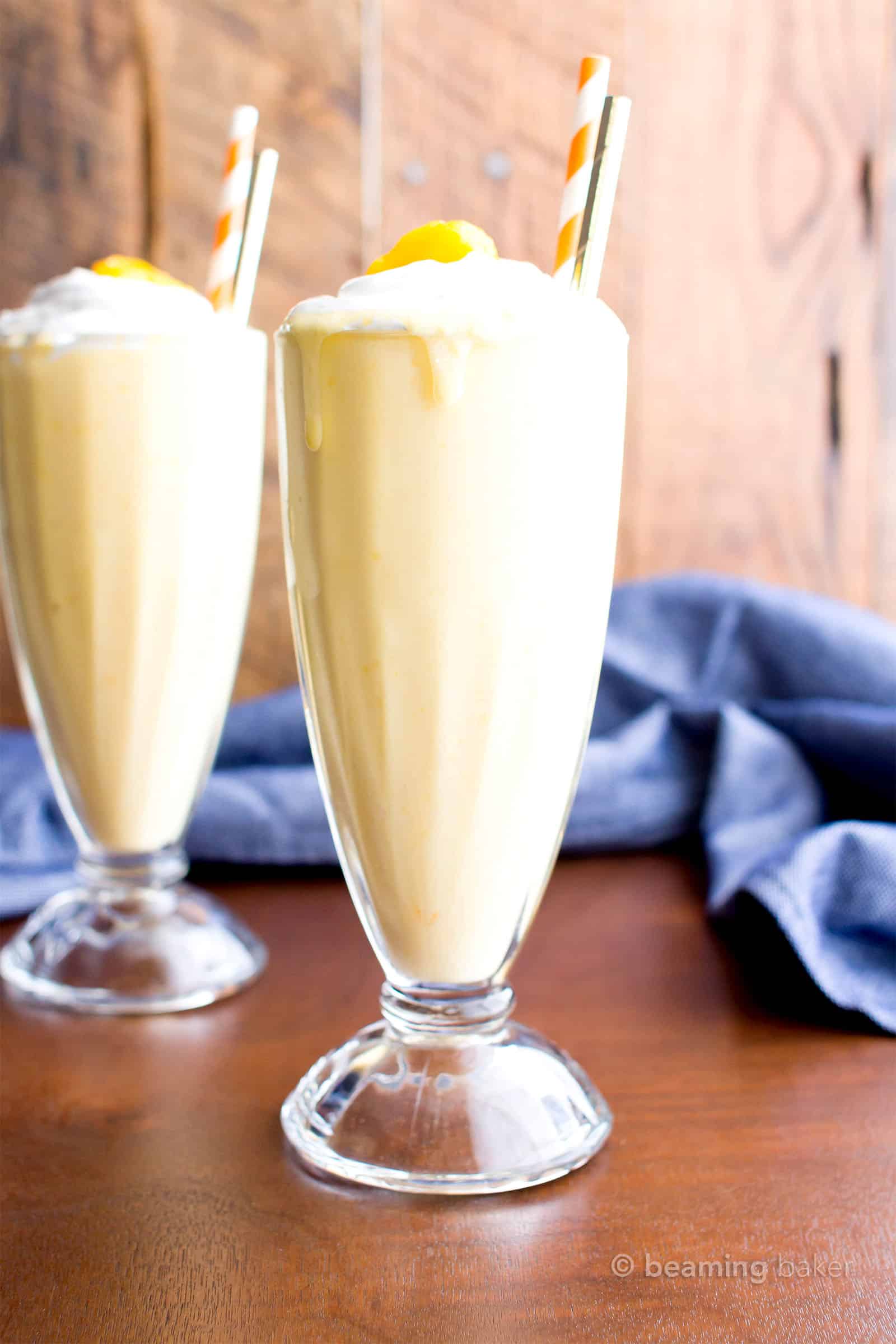 Mango Vegan Milkshake: this 3 ingredient vegan milkshake recipe is thick ‘n creamy with delicious mango coconut flavor. The easiest homemade vegan milkshake! #Vegan #Milkshake #Mango | Recipe at BeamingBaker.com