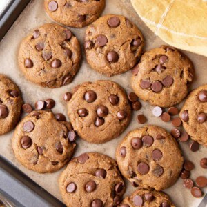 Vegan Peanut Butter Chocolate Chip Cookies: an easy recipe for chewy, moist vegan peanut butter chocolate chip cookies bursting with deep peanut butter flavor. #Vegan #PeanutButter #ChocolateChip #Cookies | Recipe at BeamingBaker.com