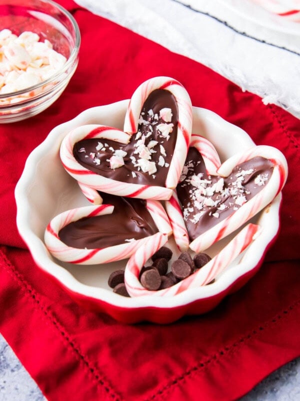 Candy cane hearts including two mini candy canes with a chocolate center topped with crushed candy canes.