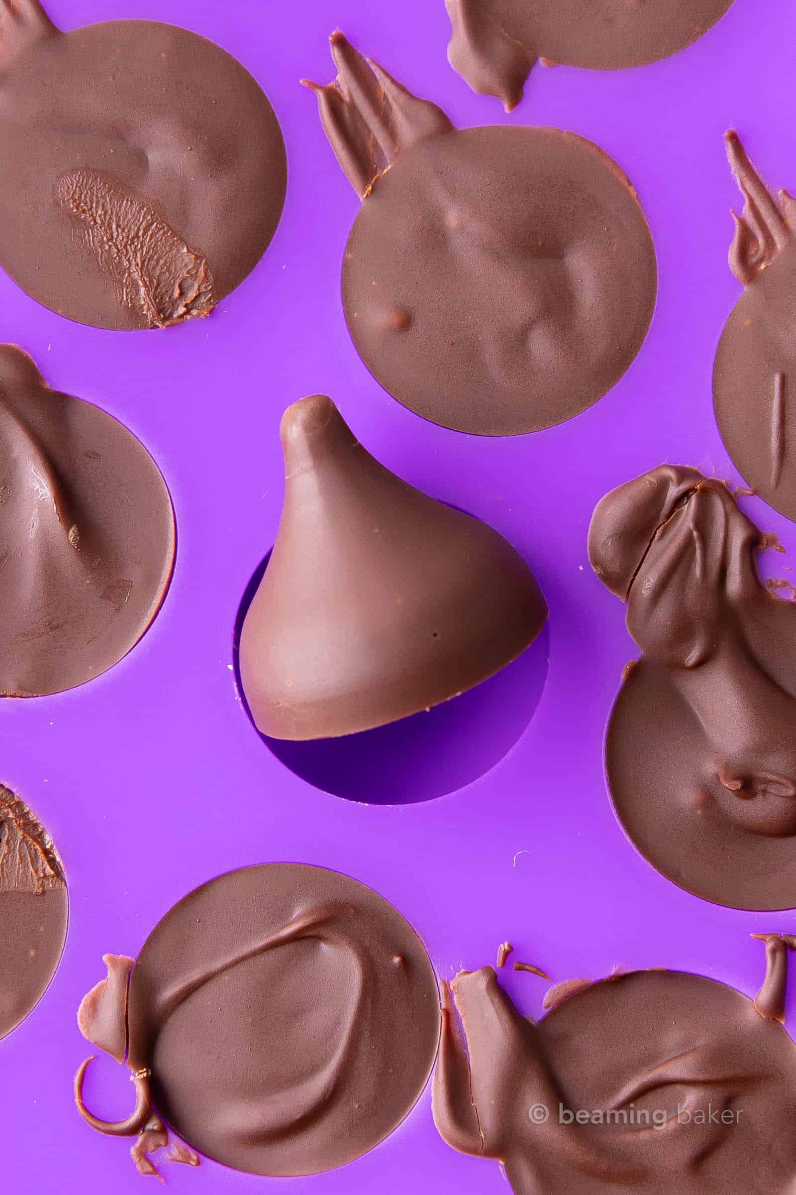 close up shot of a completed vegan Hershey kiss upturned on candy mold