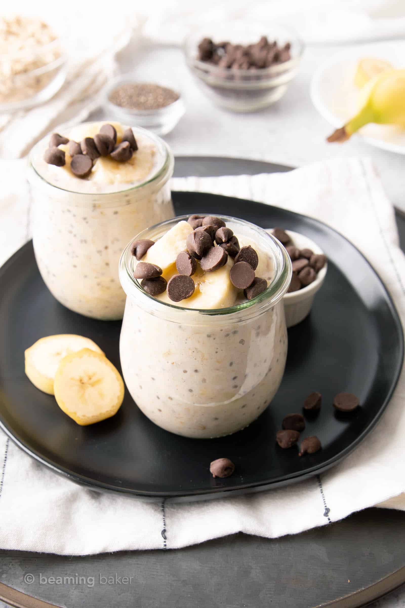 jars of overnight oats banana chocolate chip with slices of banana and chocolate chips