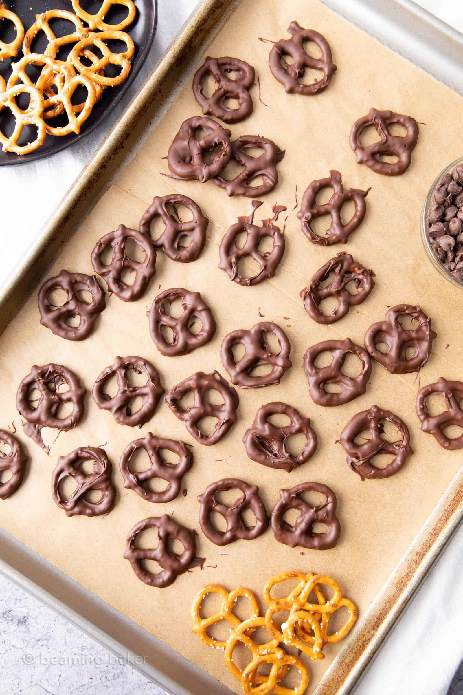 Full sheet of chocolate covered pretzels that have been dipped in chocolate