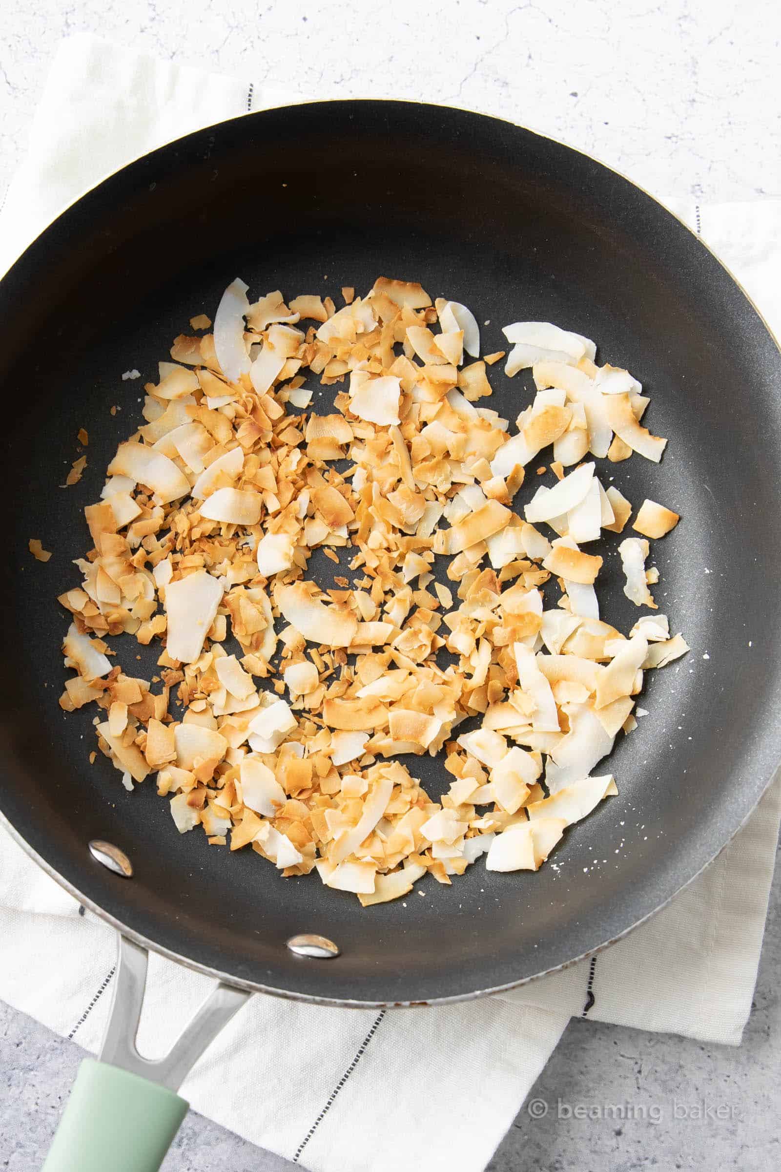 coconut in pan after using the best way to toast coconut