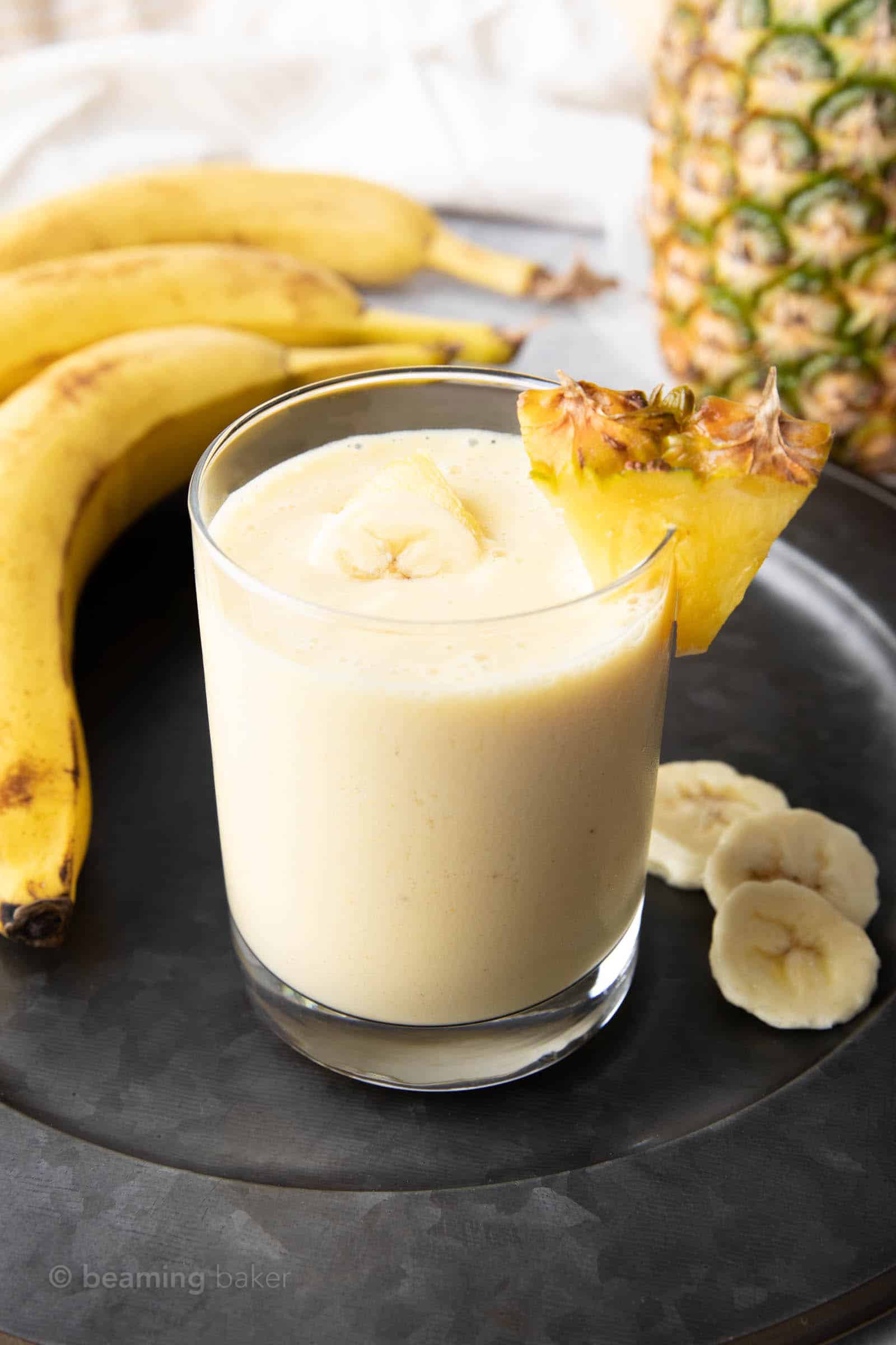 pineapple banana smoothie in a glass cup