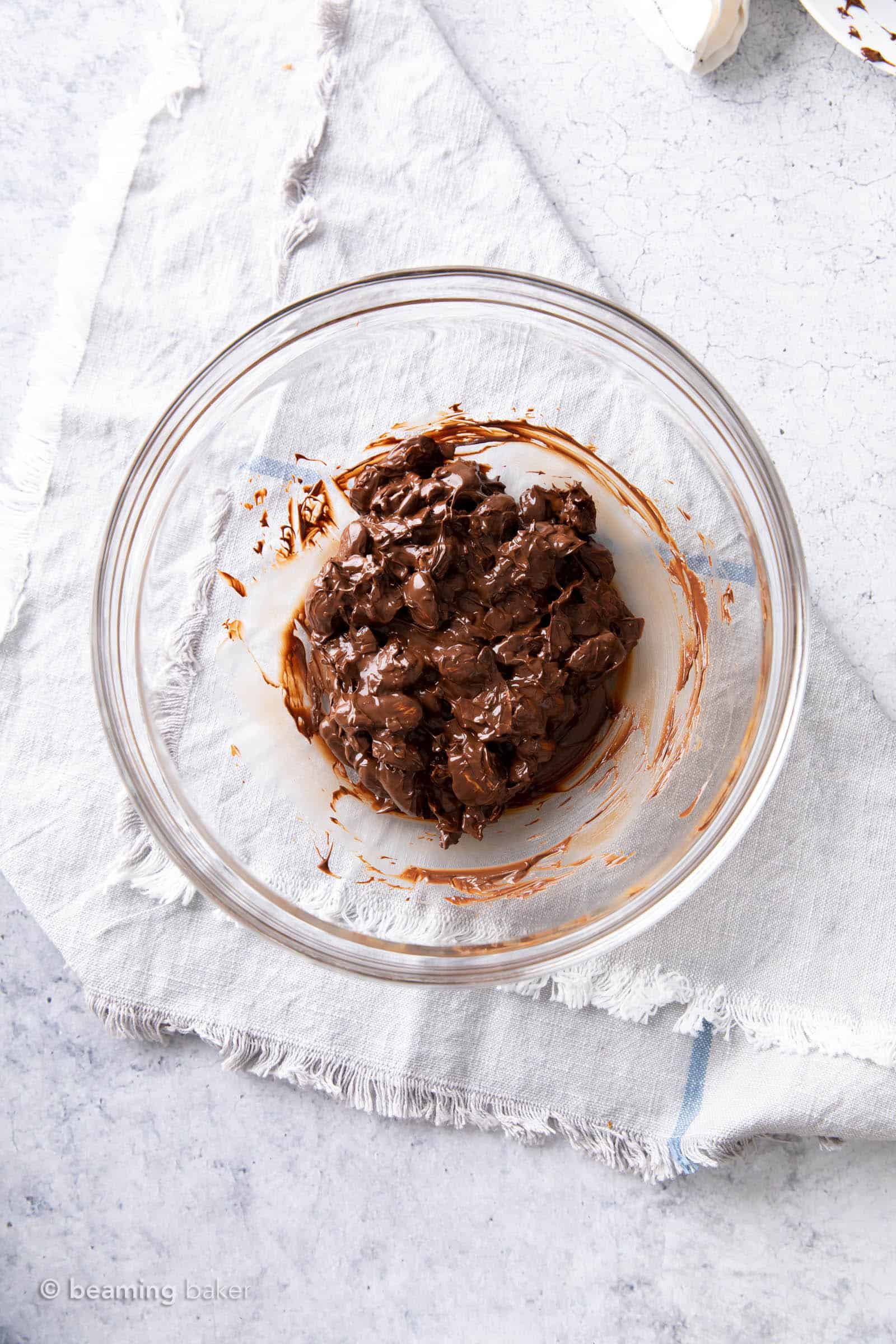 The finished dark chocolate candy mixture in a glass bowl