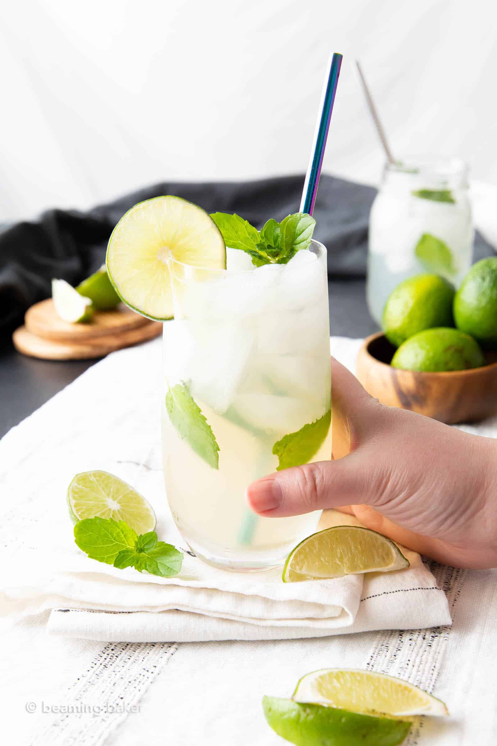 far shot of hand holding low carb mojito