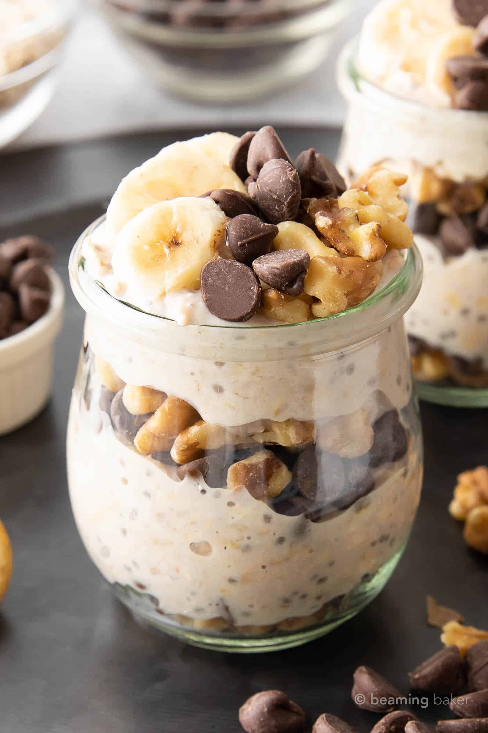 closeup of chunky monkey overnight oatmeal with fresh banana slices and walnuts