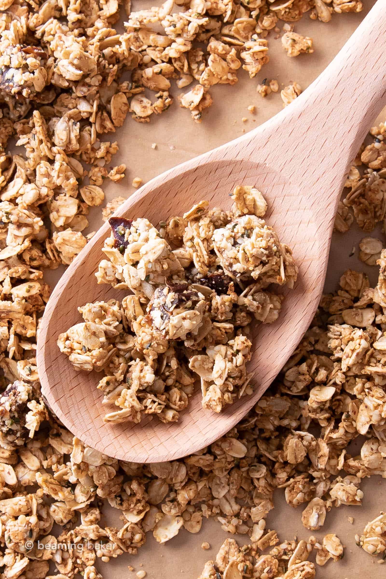 super closeup shot of hemp granola clusters on wooden spoon