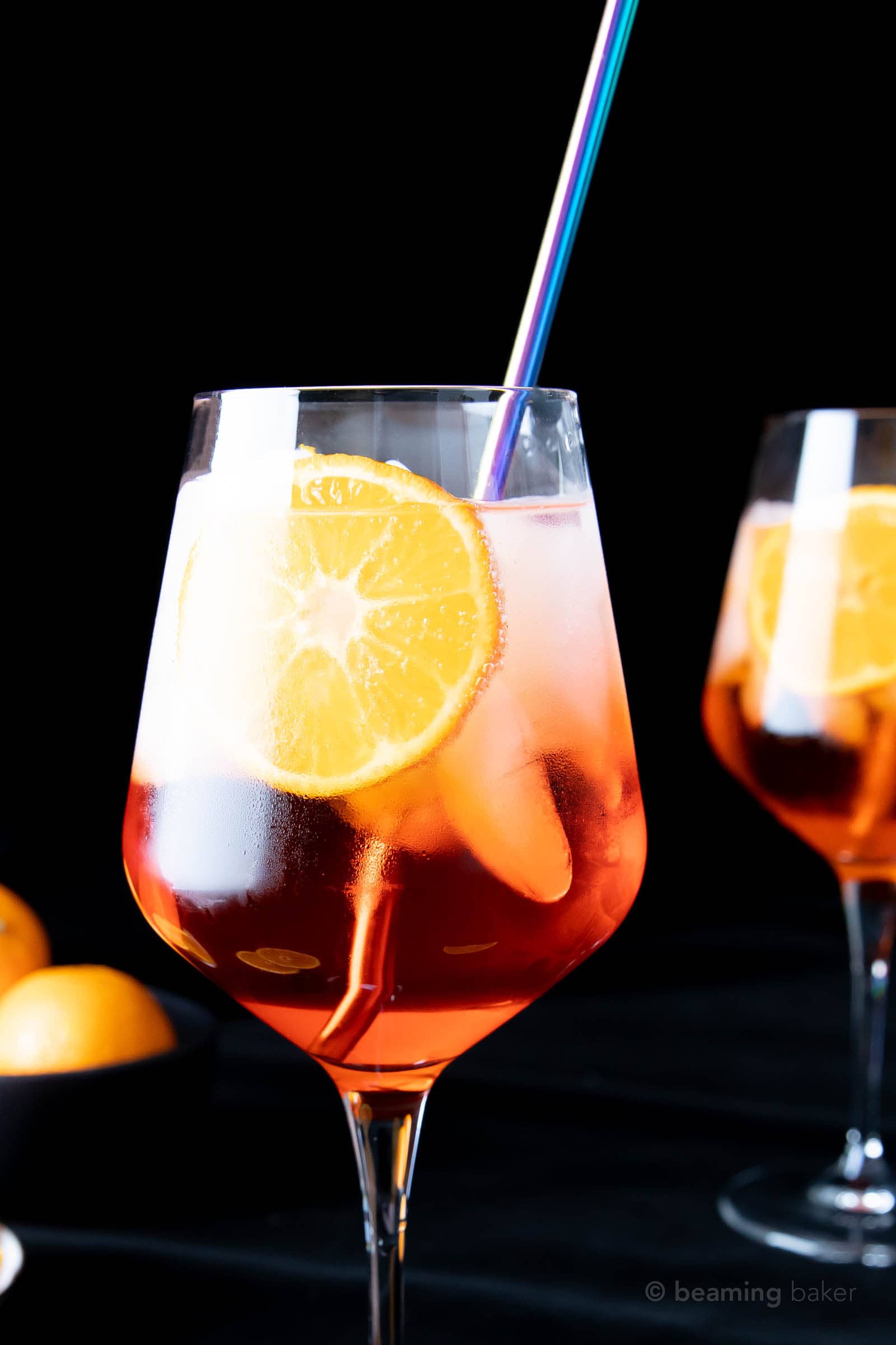 closeup of a wine glass filled with Aperol Spritz cocktail