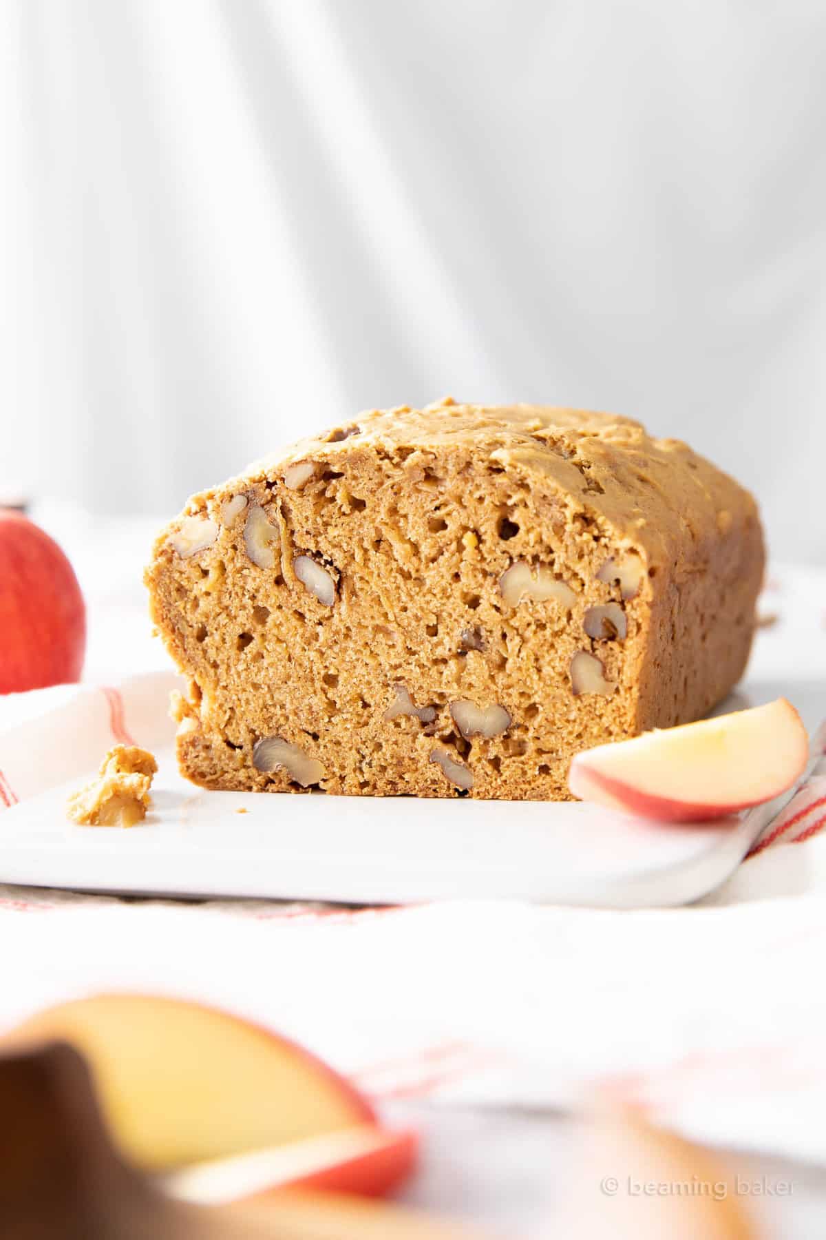 Photo of the inside of a loaf of this apple bread recipe to show moistness and texture
