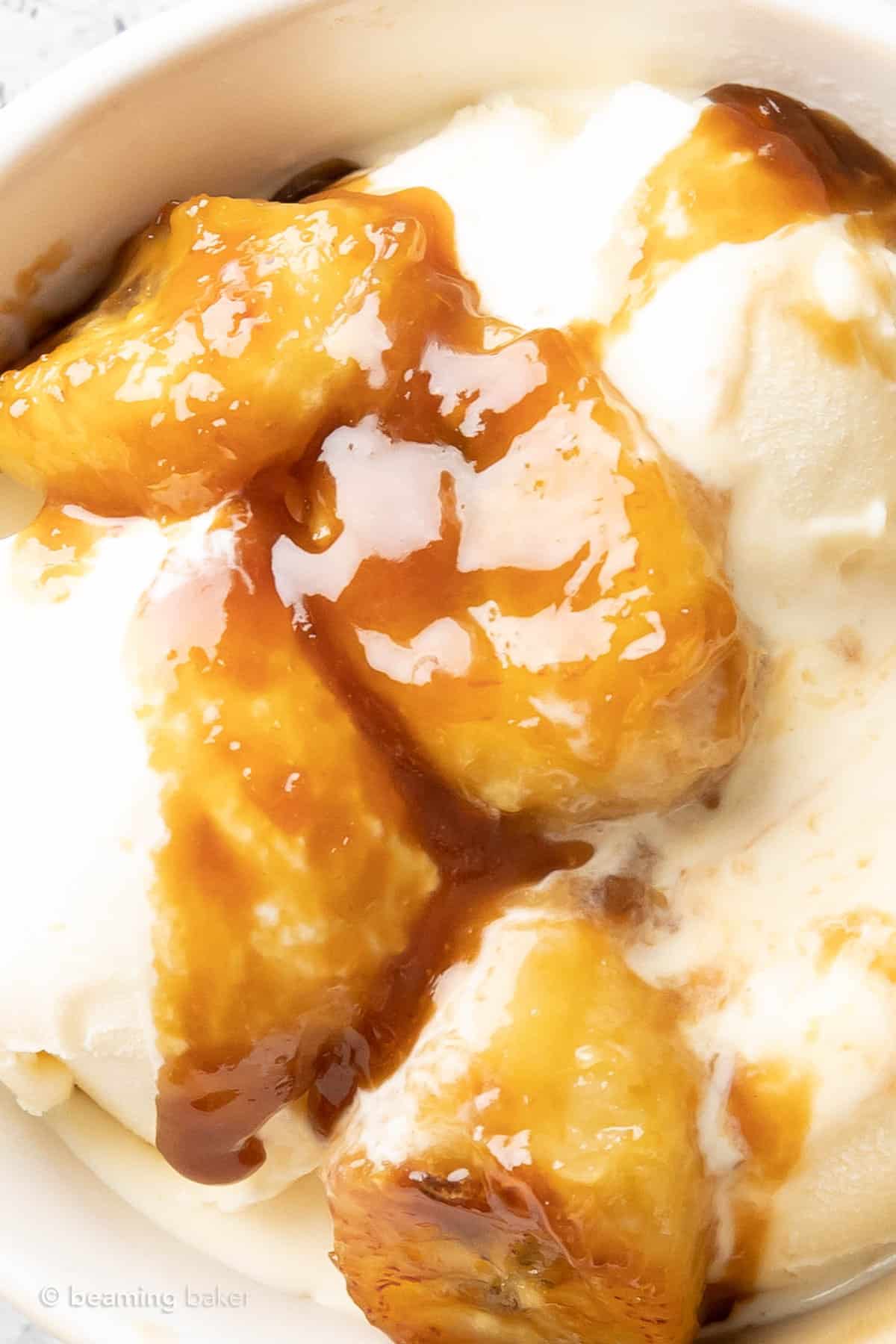 extra gooey caramel drizzle atop bananas and vanilla ice cream