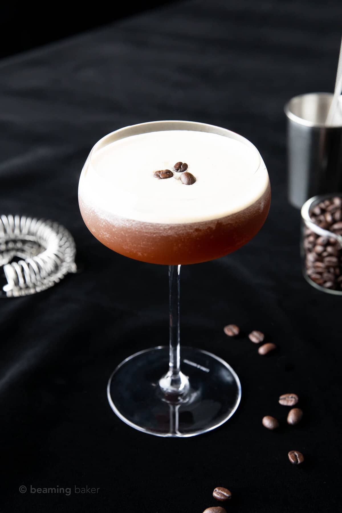 angled shot of coffee martini against a black backdrop