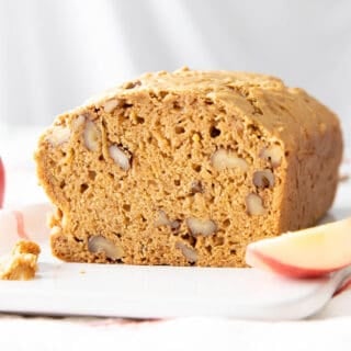 featured photo of half a loaf of apple bread with apple slices