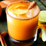 pumpkin cocktail made with tequila, pumpkin puree, and lime juice is served in an old fashioned glass
