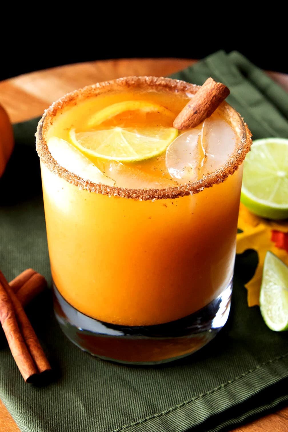pumpkin cocktail made with tequila, pumpkin puree, and lime juice is served in an old fashioned glass