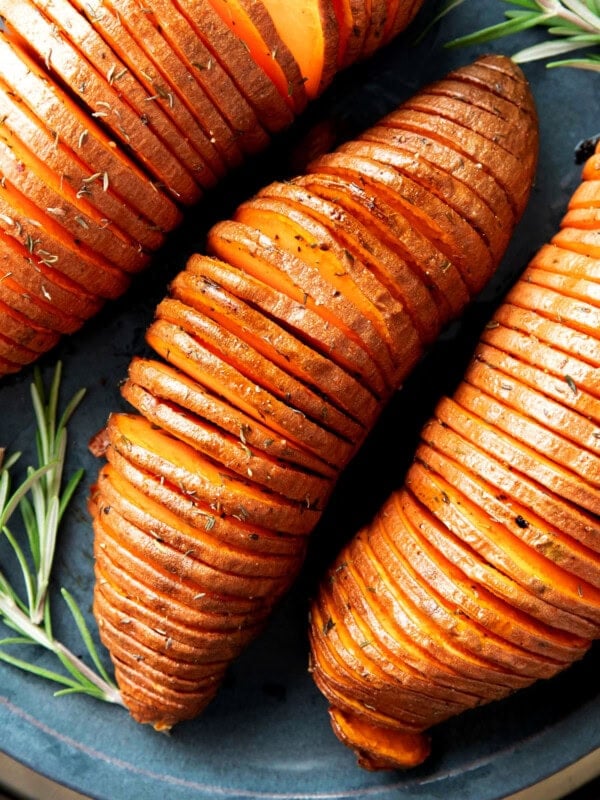 closeup of Hasselback sweet potatoes to show thin slices