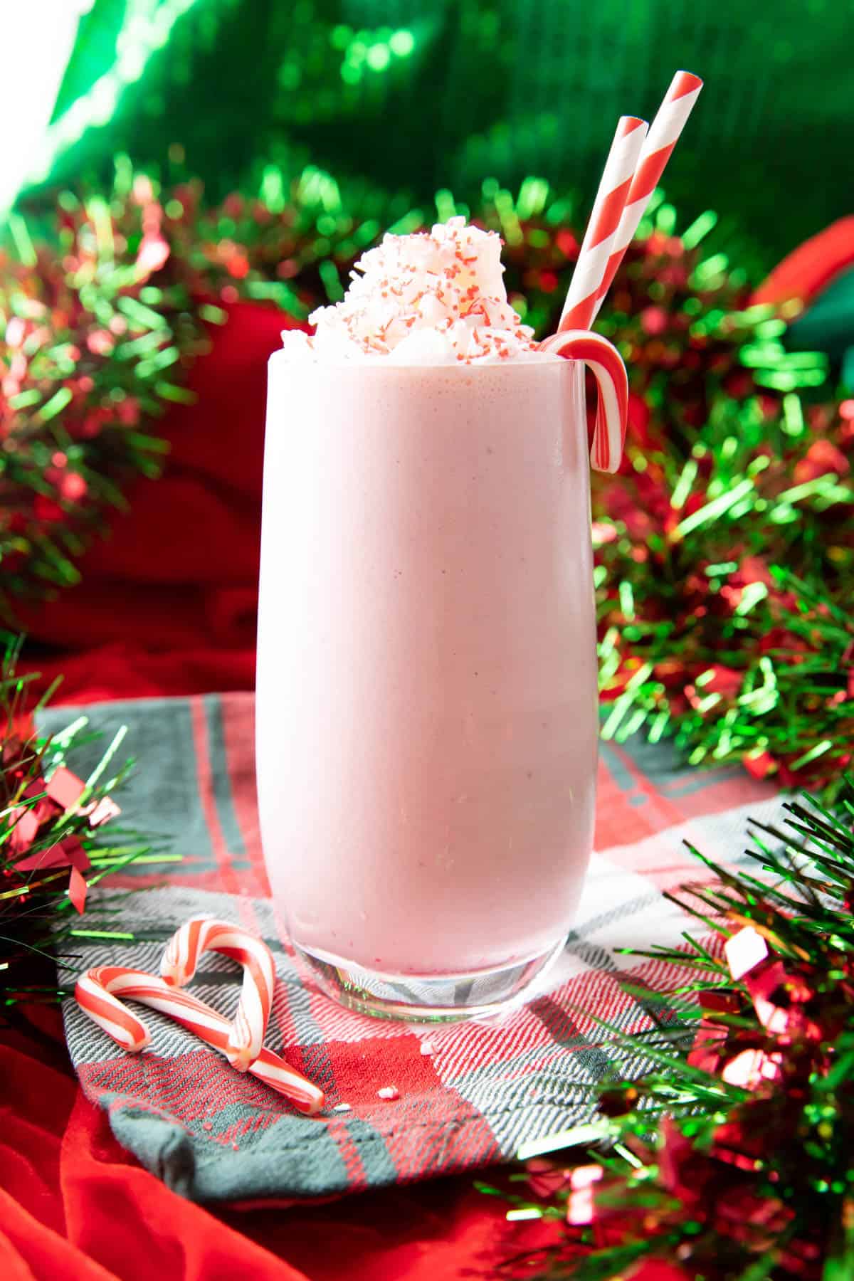 peppermint milkshake against a festive red and green backdrop