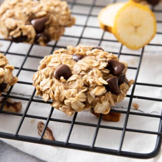 square photo of banana oatmeal cookies on a cooling rack