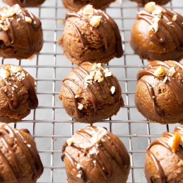 square photo of date balls on a silver rack