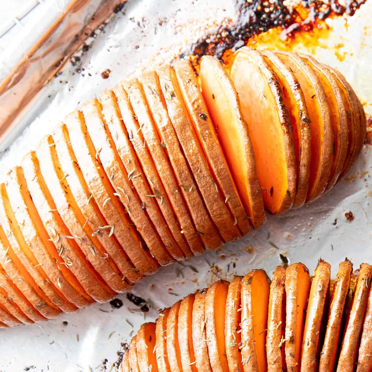 The charred and caramel texture of this recipe on a foil lined baking sheet