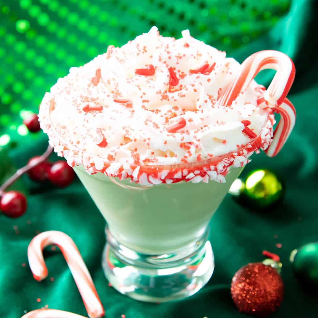 Peppermint martini topped with candy cane sprinkles